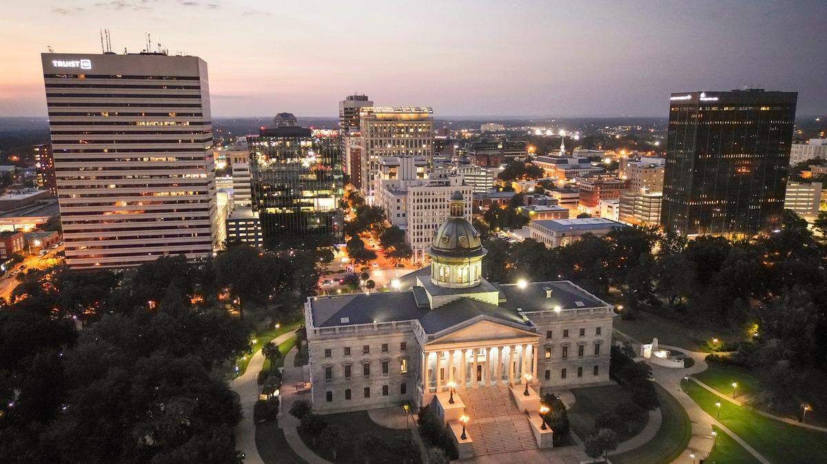 The South Carolina State House in Columbia, S.C., is seen after sunset on Saturday, Aug. 19, 2023. (Travis Bell/STATEHOUSE CAROLINA)