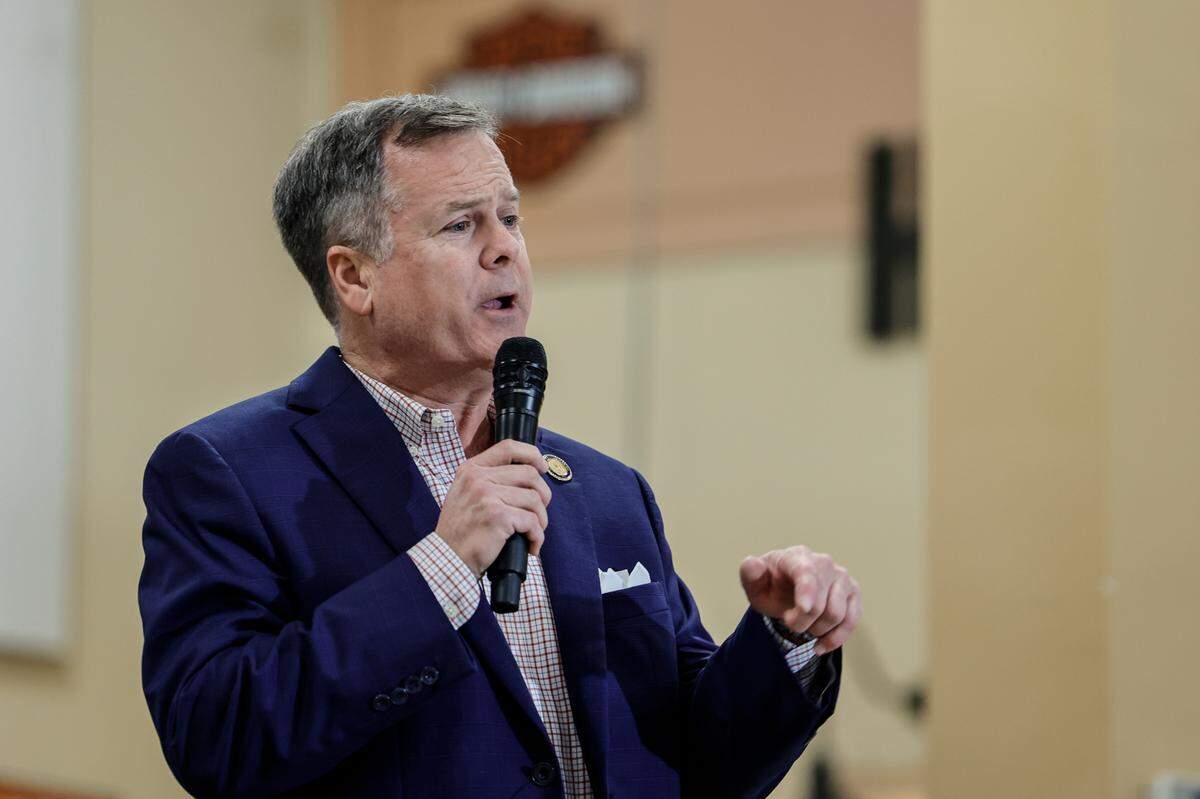 S.C. Rep. Nathan Ballentine, R-Richland,  speaks with supporters at a Nikki Haley campaign rally at Thunder Tower Harley Davidson in Elgin on Monday, Feb. 12, 2024