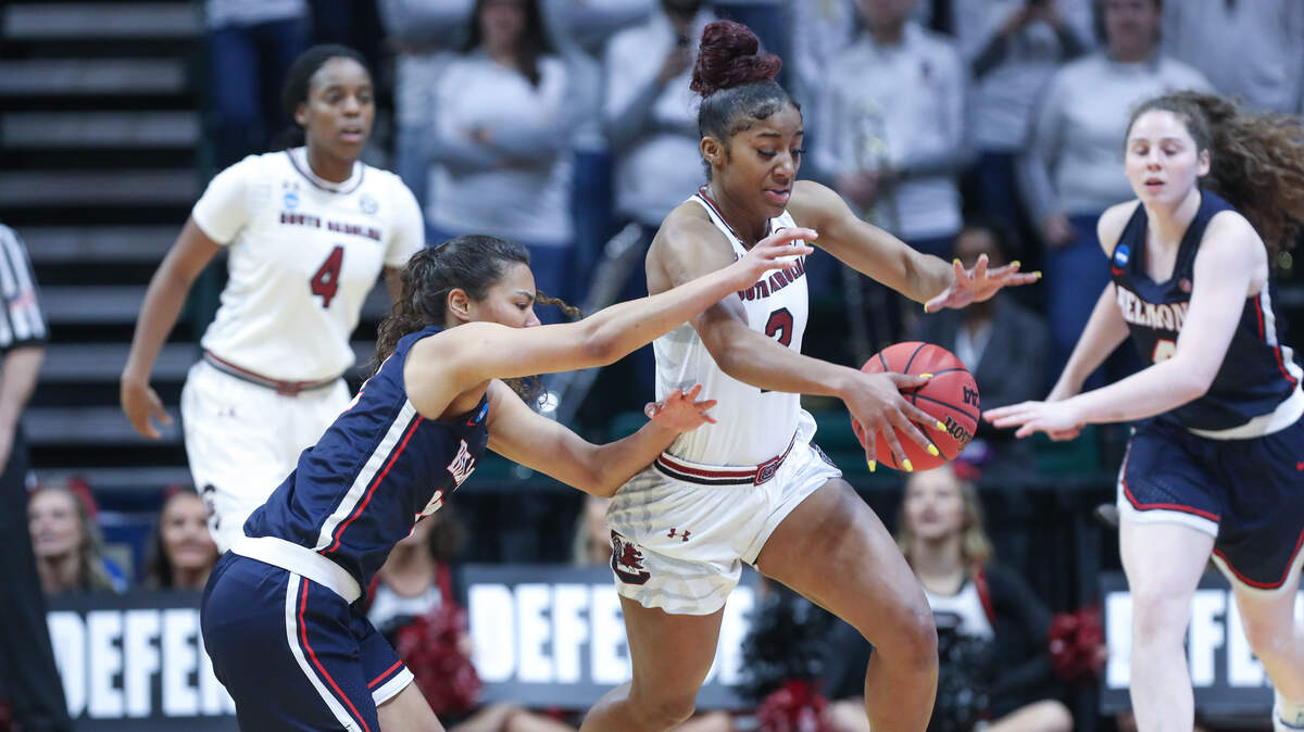 South Carolina’s Te’a Cooper (2) swipes the ball from Belmont’s Maddie Cook (22) during the first half of action in the first round of the NCAA Tournament at Halton Arena in Charlotte. 3/22/19
