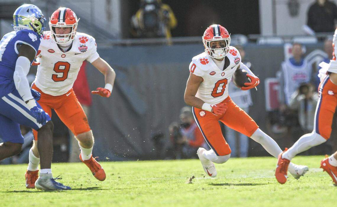 Clemson wide receiver Antonio Williams(0) runs after a catch during the second quarter of the TaxSlayer Gator Bowl at EverBank Stadium in Jacksonville, Florida, Friday, December 29, 2023.