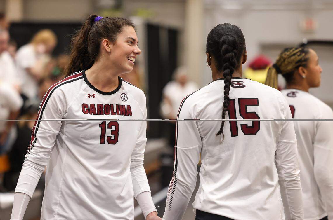 South Carolina outside hitter Alayna Johnson (13) laughs with outside hitter Nia Hall (15) before the Gamecocks’ game against Texas A&M at the Carolina Volleyball Center in Columbia on Wednesday, October 1, 2025.