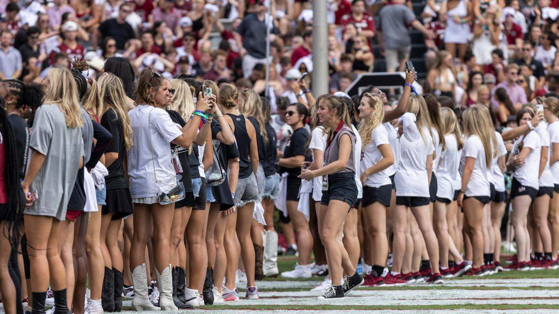 South Carolina female athletes acknowledge the crowd while being recognized at Williams-Brice Stadium on Saturday, September 18, 2022.
