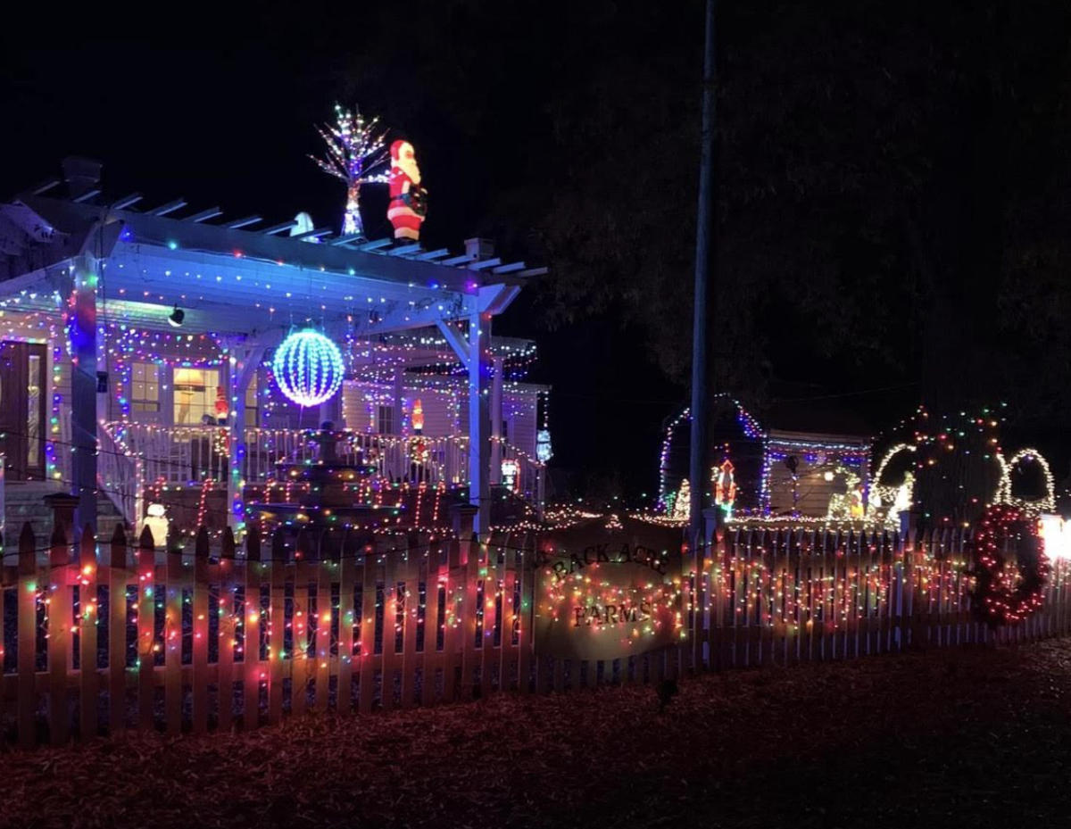 Mike Ritchie has been decorating for a few years and adds more each year. Thousands of lights and Santa on the roof.