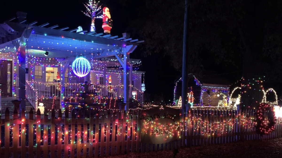 Mike Ritchie has been decorating for a few years and adds more each year. Thousands of lights and Santa on the roof.