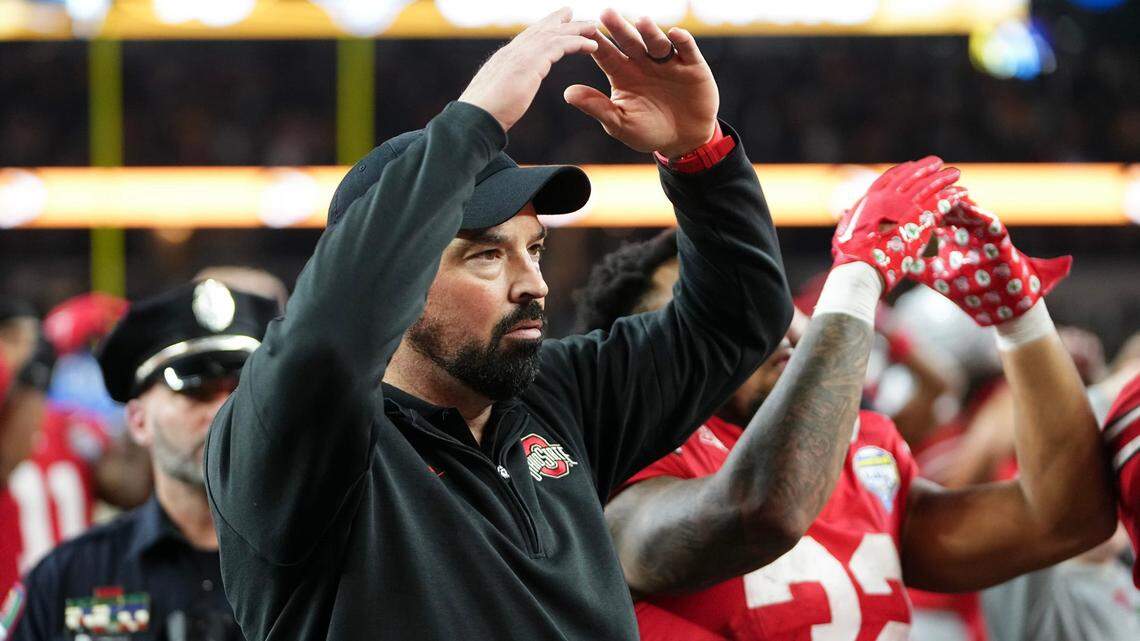 Dec 29, 2023; Arlington, Texas, USA; Ohio State Buckeyes head coach Ryan Day sings “Carmen Ohio” following the 14-3 loss to the Missouri Tigers in the Goodyear Cotton Bowl Classic at AT&T Stadium.