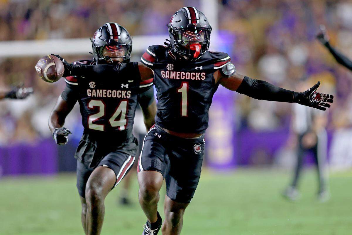 Defensive back DQ Smith #1 of the South Carolina Gamecocks celebrates a second quarter interception of quarterback Garrett Nussmeier of the Louisiana State Tigers at Tiger Stadium on October 11, 2025 in Baton Rouge, Louisiana.