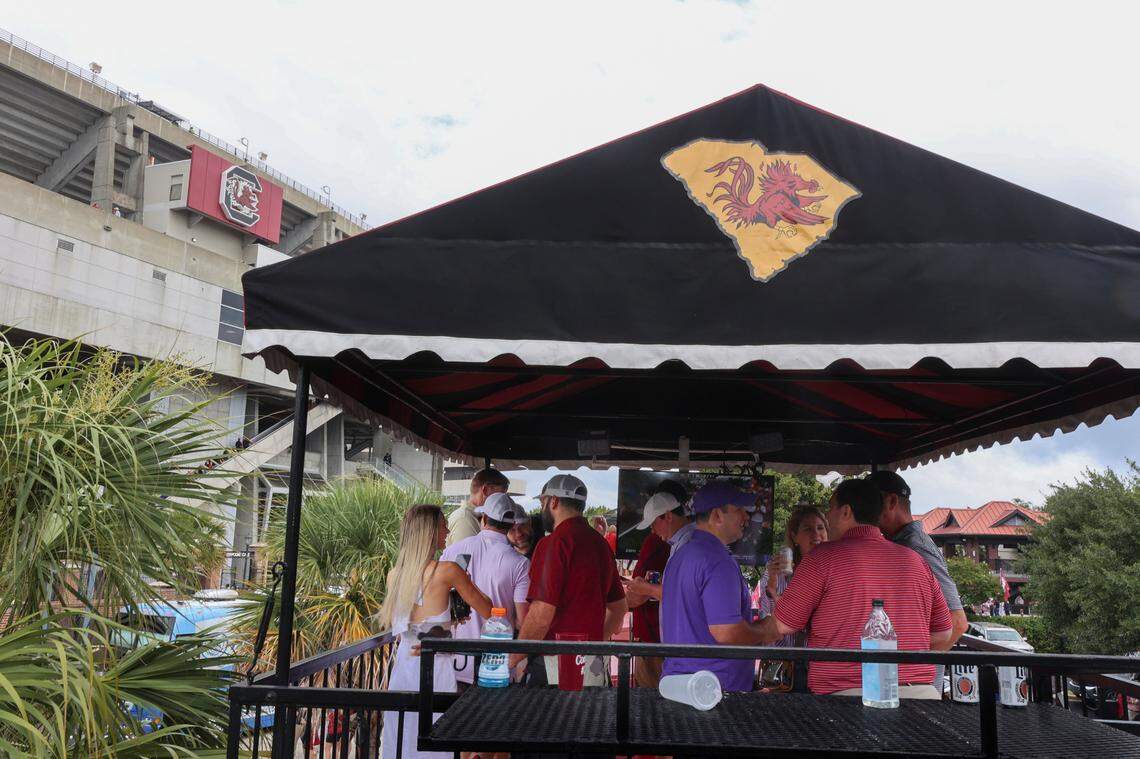 People mingle in a Cockaboose before the USC game against LSU on Saturday, Sept. 14, 2024.