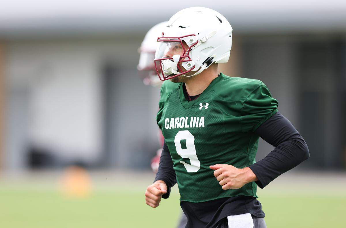 South Carolina quarterback Luke Doty (9) runs drills during practice in Columbia on Saturday, August 2, 2025.
