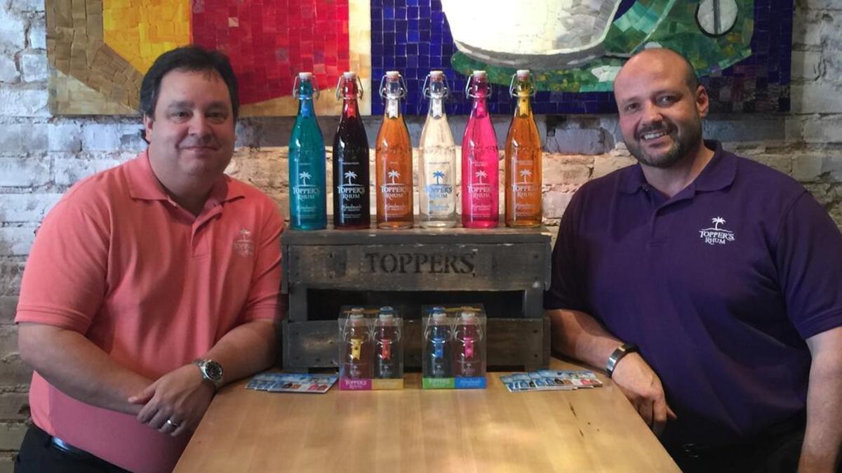 Todd King, President, CEO and owner of Topper’s Rhum with Brian Hendrix, CFO
