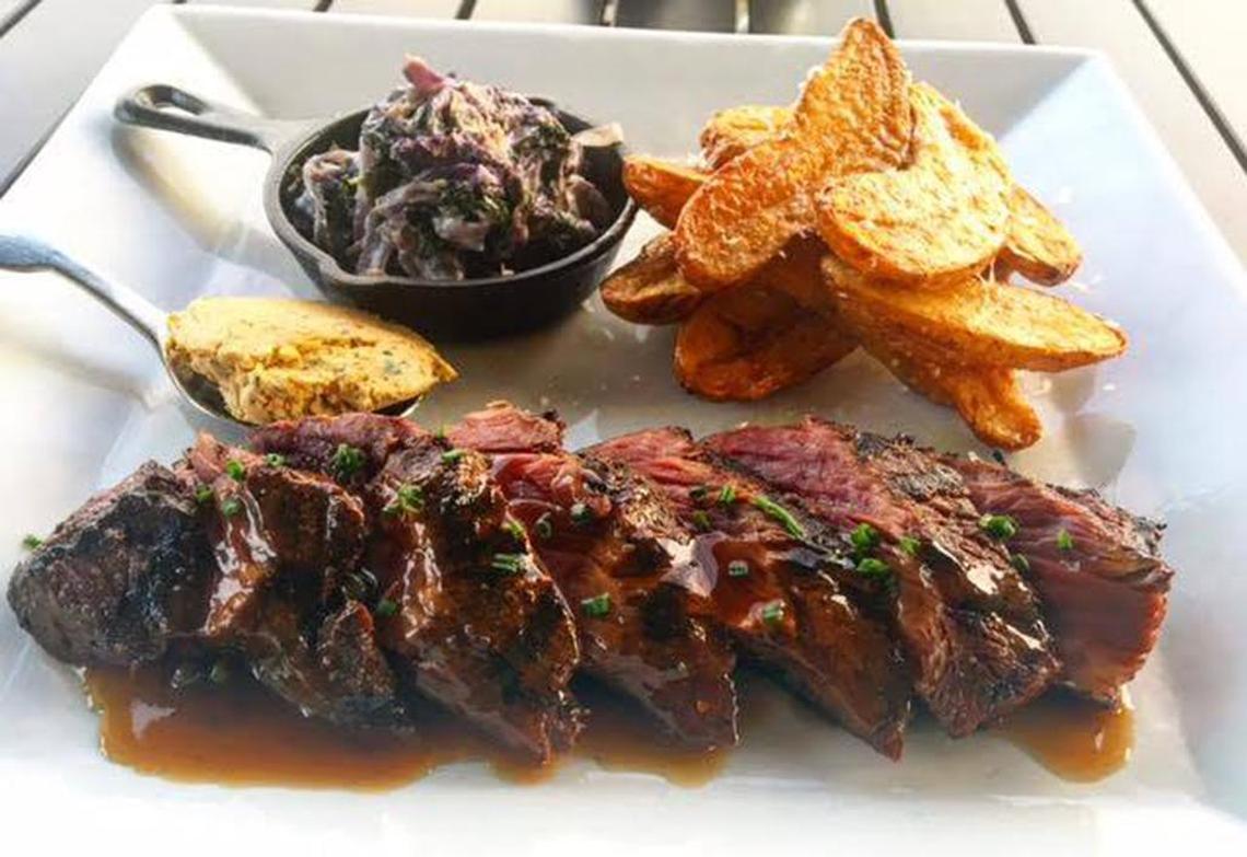 Hangar steak with fries and sides at Solstice Kitchen