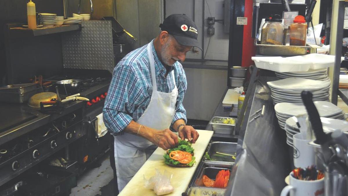 Harvey Nathan works in his Hello Deli kitchen in North Charleston.