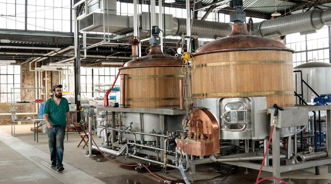 Kevin Varner, who owns Hunter-Gatherer, is brewing beer in the recently renovated Curtiss-Wright Hangar.