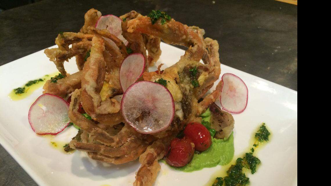 
Chef Wesley Fulmer, of Motor Supply Co. Bistro, created a dish of Crispy Soft Shell Crab with Sweet Pea Basil Pesto, Roasted Grape Tomatoes and Lever Farms Spring Onion and Citrus Gremolata. The short season for soft shell crab is now and local restaurants are serving up variations of this delicate dish.
