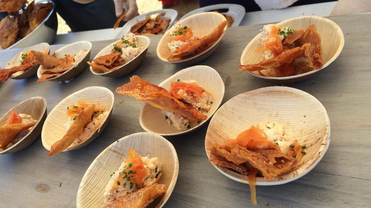 Grits aren’t just for shrimp any more. Here, Chef Jeremiah Langhorne takes Anson Mills grits and makes tasty chips served with smoked catfish dip, cheddar cheese and pickled red onion.