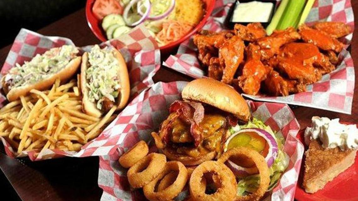 A selection of sandwiches and wings from Top Dawg Tavern