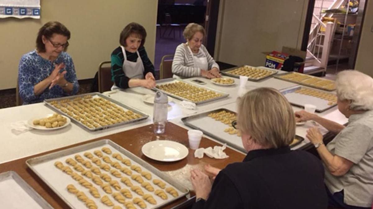 The ladies of St. Katherine’s Ladies Philoptocos Society prepare Greek pastries for the annual bake sale on April 6.