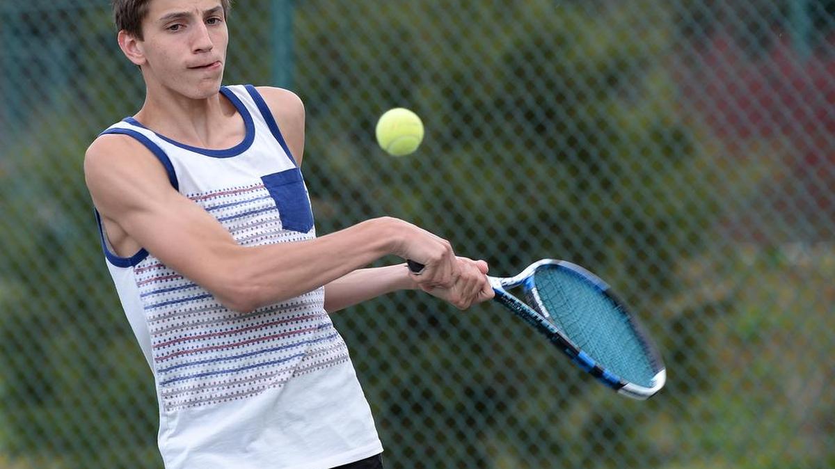 Baptiste Lemaire takes a tennis lesson recently in Greer. Baptiste’s tennis was jeopardized when he was misdiagnosed with asthma.