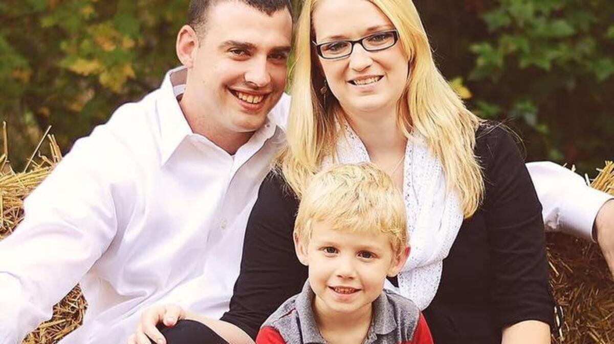 Cancer survivor Kylie Henson with her son, Noah, and boyfriend U.S. Army Spc. Brandon Johnson.