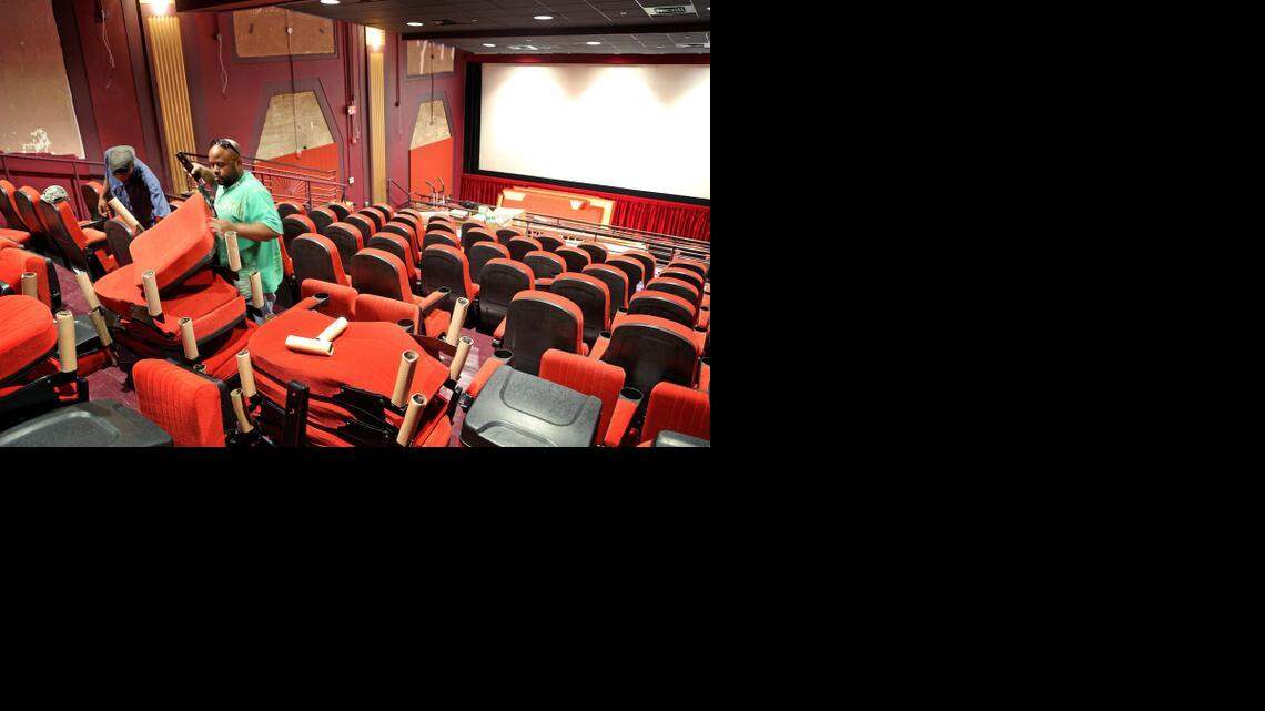 
Antonio Goodwin helps install the seats for the new upstairs theater at Nickelodeon movie house on Main Street, Wednesday, March 25, 2015. Work is also underway throughout the theater and includes the addition of an elevator.
