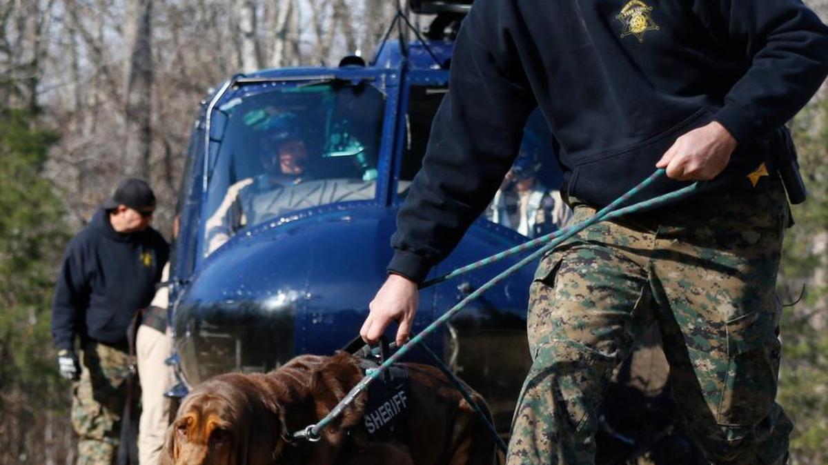 Bloodhound handlers from around the country are in York County for a week-long wilderness training class for bloodhounds. Here, York County Sheriff’s Deputy Dustin Sierra leads Dixie, from the Anderson County Sheriff’s Office, away from the SLED helicopter after a training exercise Wednesday.