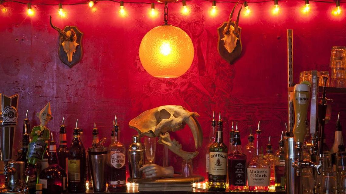 The Whig’s decor is unusual, with a saber-toothed tiger skull and taxidermied animals mounted on the wall.