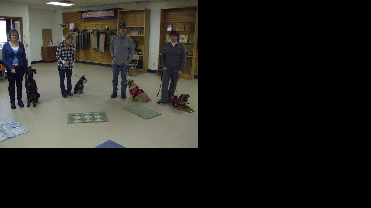 
Volunteers with Big Paws Canine Academy & Foundation Inc. Midwest site in Sioux Falls, S.D., stand with beginner service dogs to be trained to help veterans and former first responders with disabilities. The charity’s Aynor location will celebrate its grand opening with a chili cook-off, 10 a.m.-2 p.m. Saturday at 1379 Horry Road.

