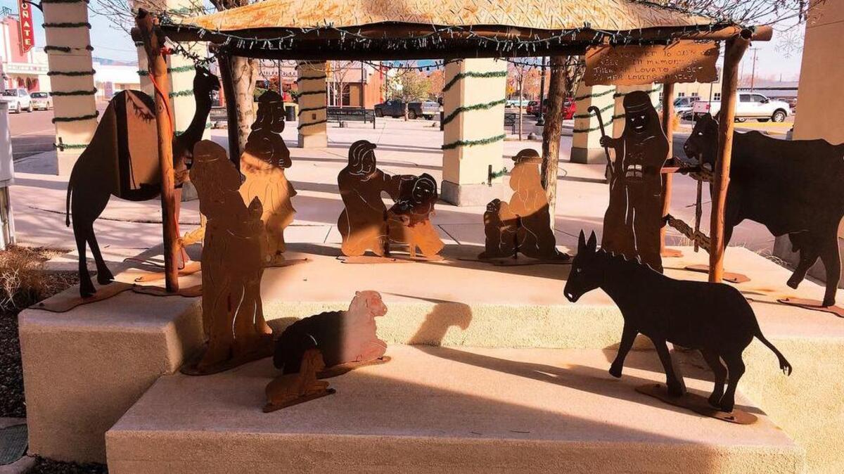 A year-round Nativity scene stands near City Hall in Belen, N.M. Annual battles over erecting Nativity scenes on public land continue to pit some residents against advocacy groups pushing separation of church and state.