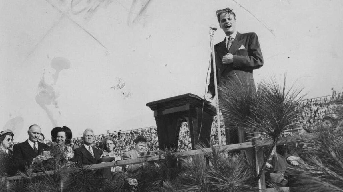
The Rev. Billy Graham speaks during a 1950 crusade at Carolina Stadium (today, Williams-Brice).

