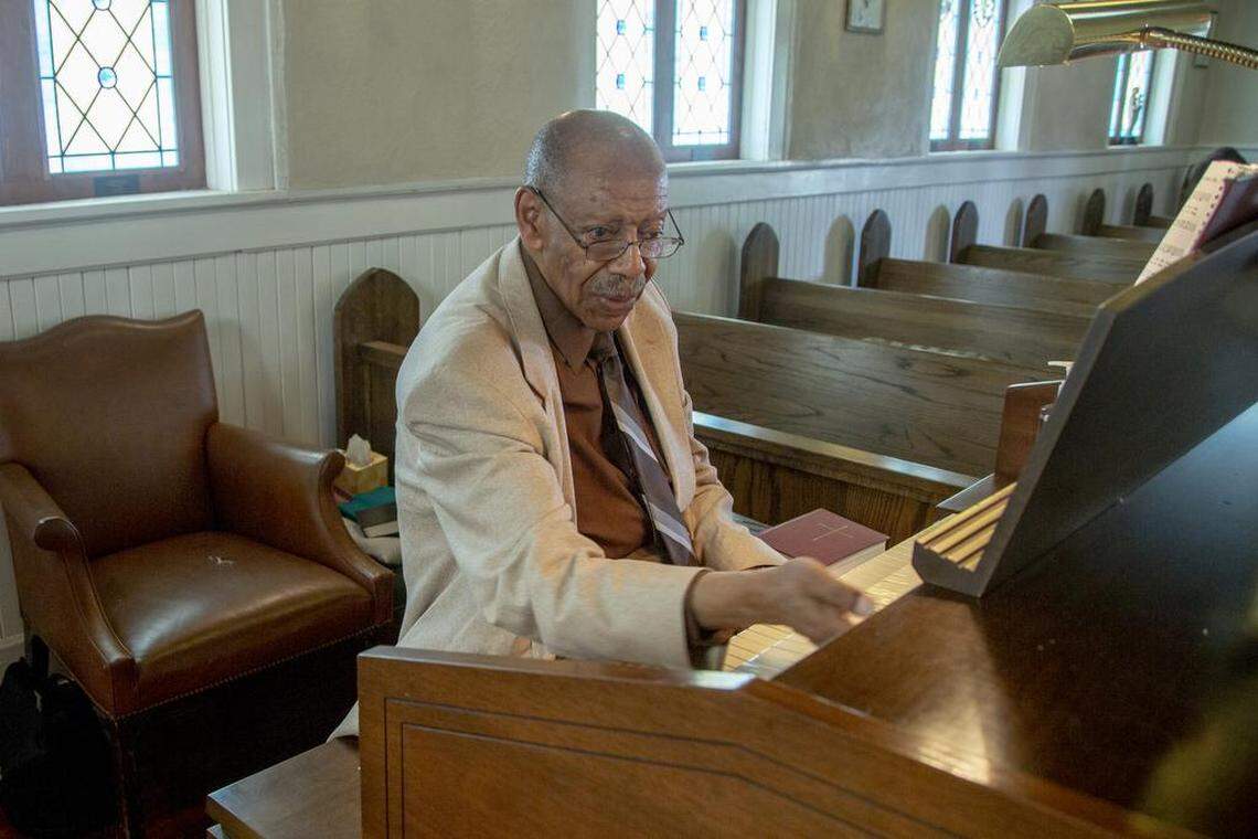 Therlon Joyner plays organ during a service at The Episcopal Church of The Epiphany in Spartanburg. The church was founded in 1893.