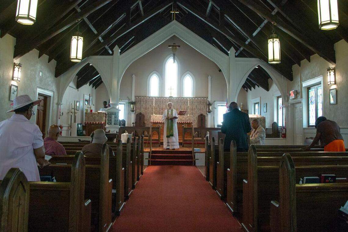 The Rev. Charlotte Waldrop leads the service at The Episcopal Church of The Epiphany in Spartanburg. Members have seen the once-bustling church attendance fall to 20 people each Sunday, on average.