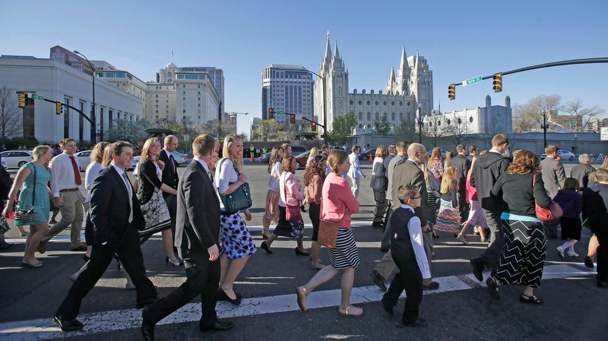 Mormons walk to the religion’s twice-yearly conference in Salt Lake City in April 2015.