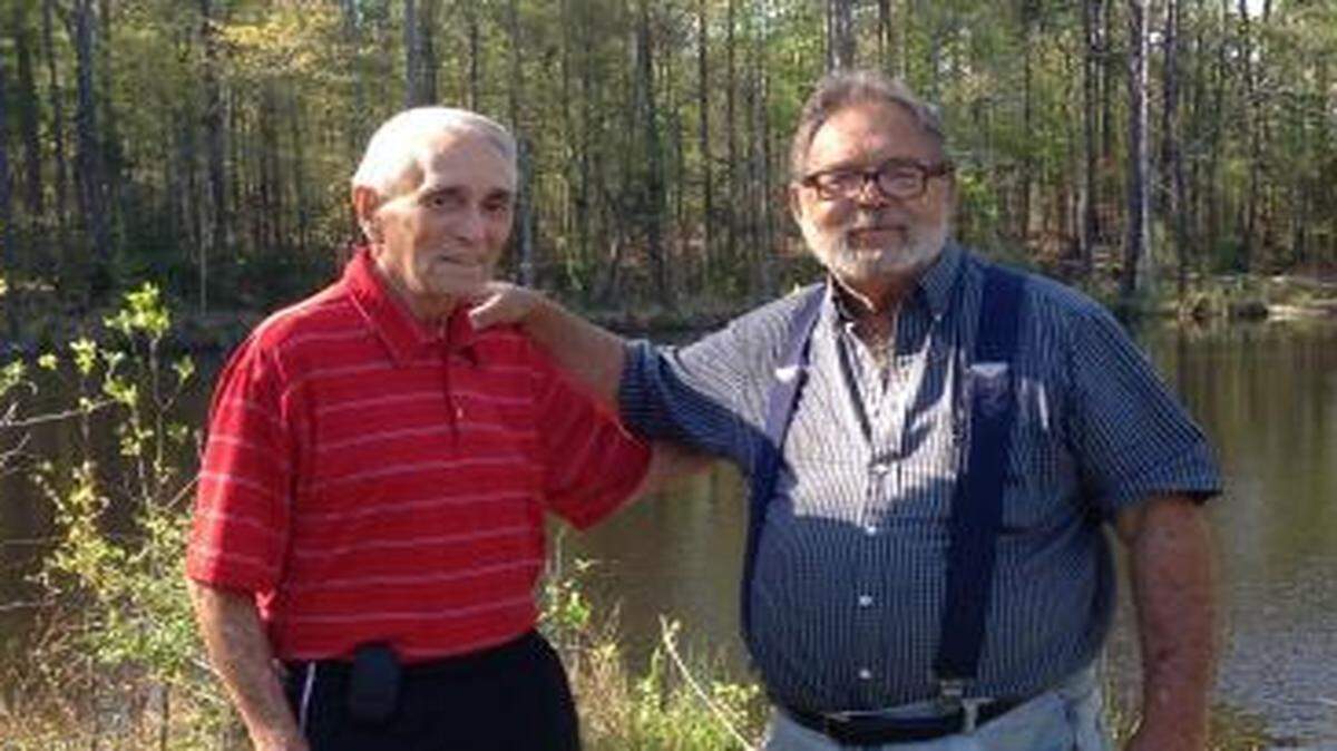 
Harvey Capell and Jim Jolly enjoy the day at Jolly’s pond in Gilbert.

