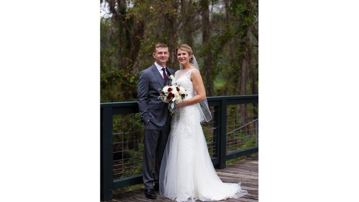 Mr. Tim Cumalander and Mrs. Laura DuBose Cumalander.