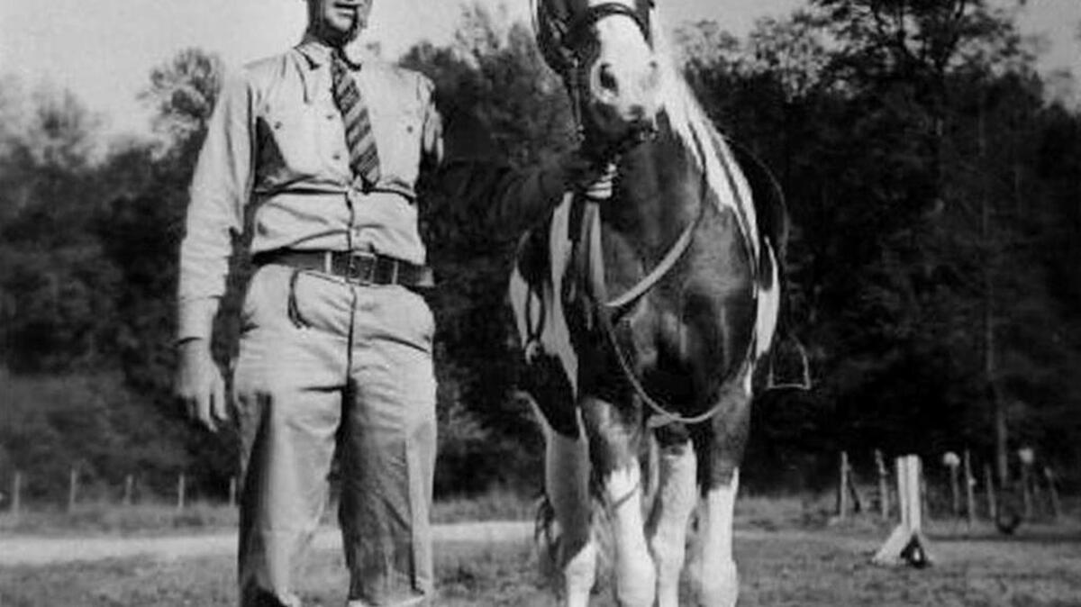 Former Webb Riding Academy instructor Hughes Webb and one of his horses.