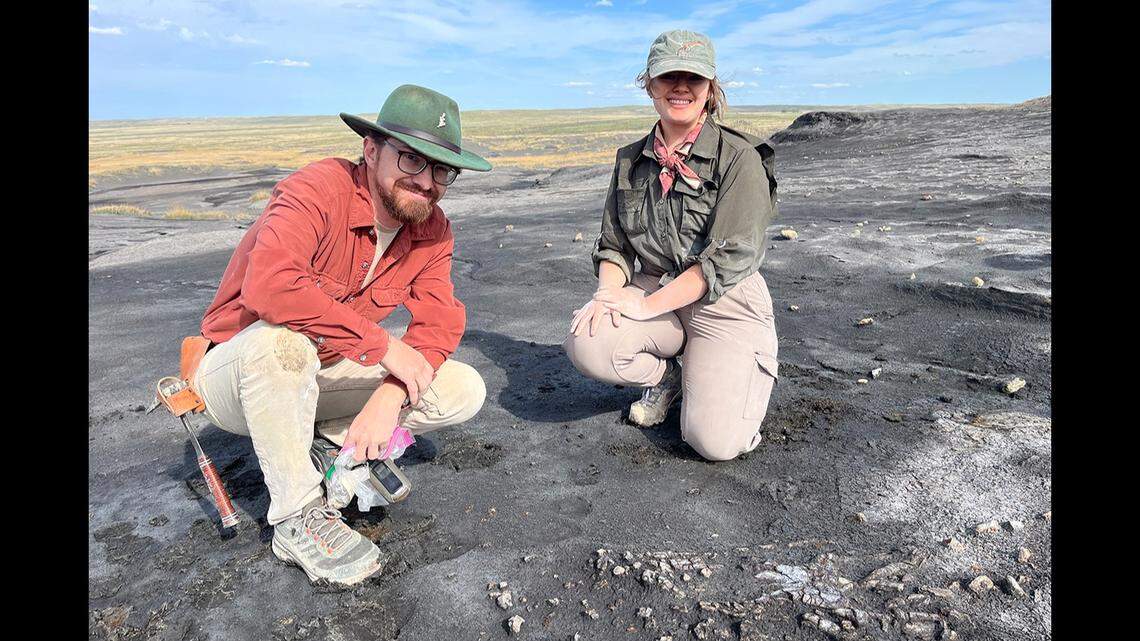Scott Persons is pictured with South Carolina college student Monika Angner, who discovered fossils on a school trip.