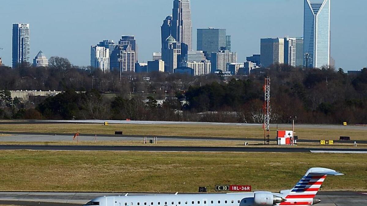 An American Eagle jet taxis to the terminal at Charlotte Douglas International Airport Wednesday.