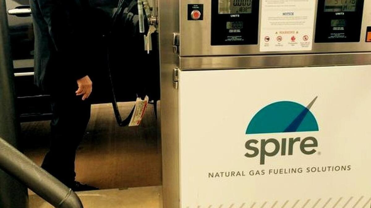 Perry Williams, a commissioner with the Greer Commission of Public Works, fills up his GMC Sierra pickup truck with compressed natural gas at the new Spire station in Greer on Tuesday, December 1, 2015.