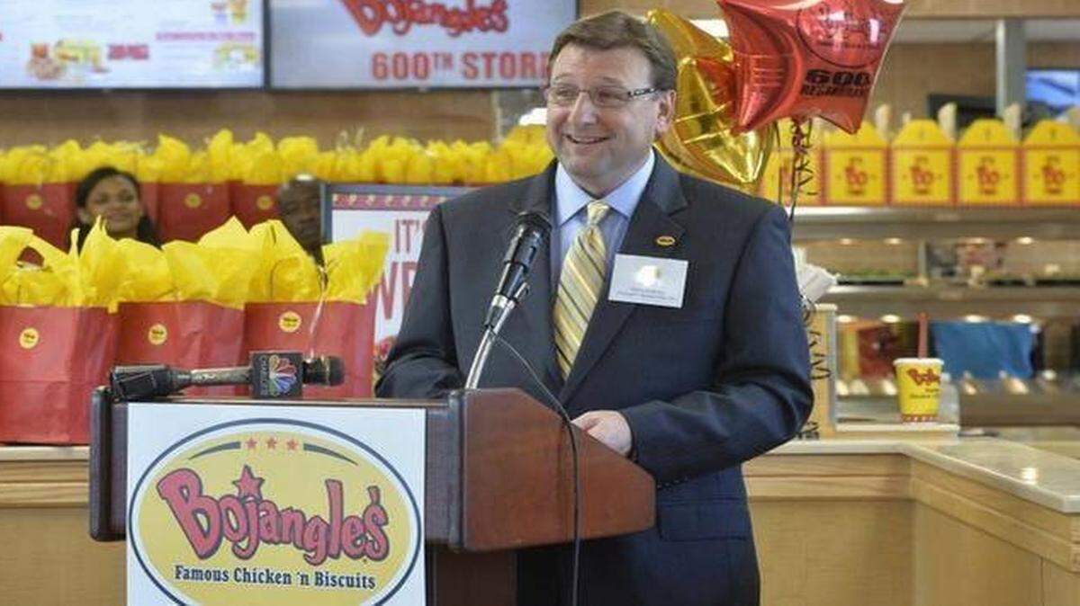 
Bojangles’ filed paperwork Monday for an initial public stock offering. Here CEO Clifton Rutledge speaks to the crowd during the opening of the fast-food chain’s 600th restaurant. 
