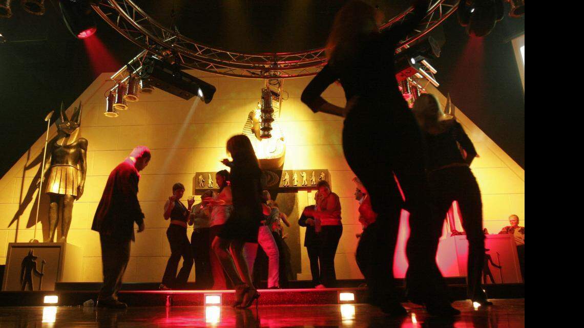 
Club goer’s take to the dance floor during Club Ra’s grand opening in December 2004. The club featured go-go dancers and a lighting and smoke-effects system.
