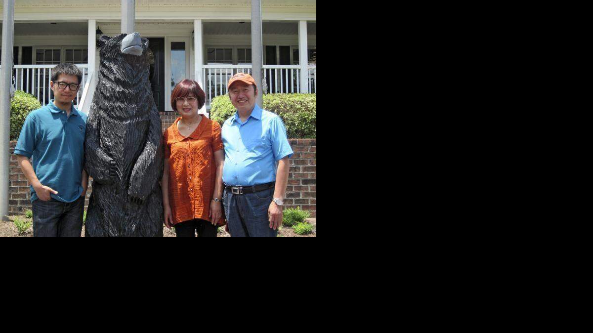 
Kang Zou and family at Black Bear Golf Club. Zou has since become part of the investor group that has purchased an additional eight courses on the Grand Strand. 
