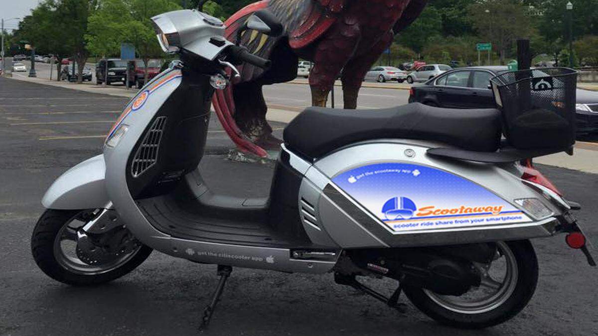 
This publicity shot depicts a giant Gamecock crowing behind a Scootaway scooter, a rental service that is to launch in Columbia next month.
