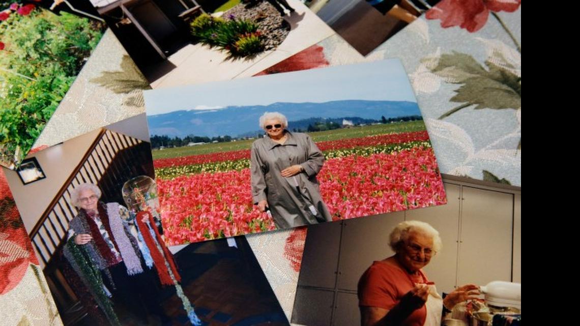 
This July 1, 2015 photo shows photos of Roslyn Duffy's late mother, Evelyn Nappa, at Duffy's home in Seattle. Duffy had to scramble to find a home willing to take Medicaid payments after her mother was evicted from a Seattle assisted-living facility. The stress and the change of surroundings strained her mother's health, Duffy said, and six weeks after moving, she was dead. 
