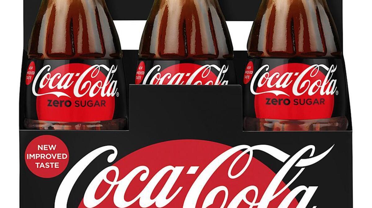 This photo provided by Coca-Cola shows a six-pack of bottled Coca-Cola Zero Sugar. Coke Zero is getting a makeover as Coke Zero Sugar in the United States. The new cans and bottles, which will incorporate more red like regular Coke, will start hitting shelves in August.
