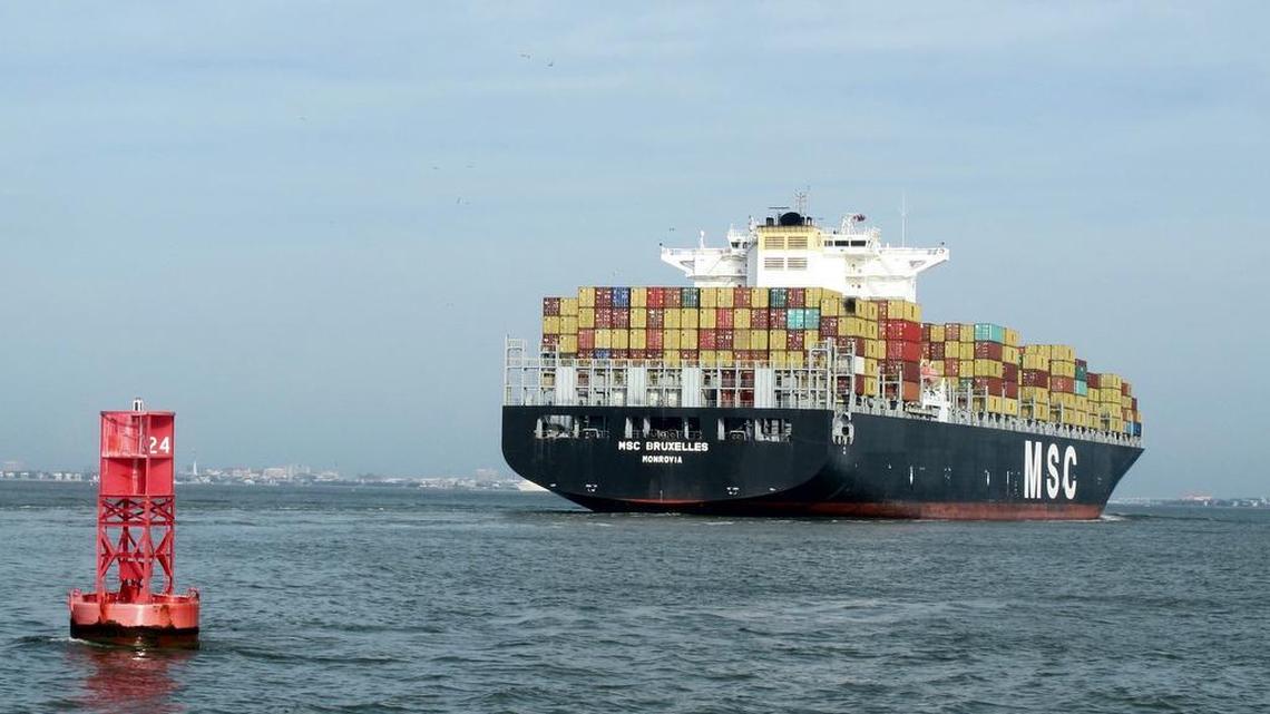 A container ship makes its way into the Port of Charleston. A new report from the University of South Carolina says the port has a $13.6-billion impact on the Midlands economy.