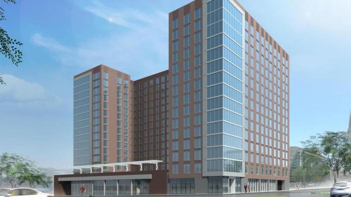 A rendering of Clayco Realty Group’s new design for a proposed apartment building next to the Richland County library in downtown Columbia.