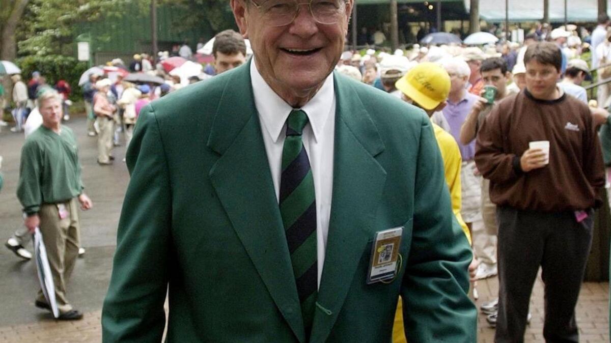 William W. "Hootie" Johnson, chairman of Augusta National Golf Club, walks through the crowd at the Augusta National Golf Club during a practice round for the 2002 Masters, Wednesday, April 10, 2002, in Augusta, Ga. (AP Photo/Elise Amendola)