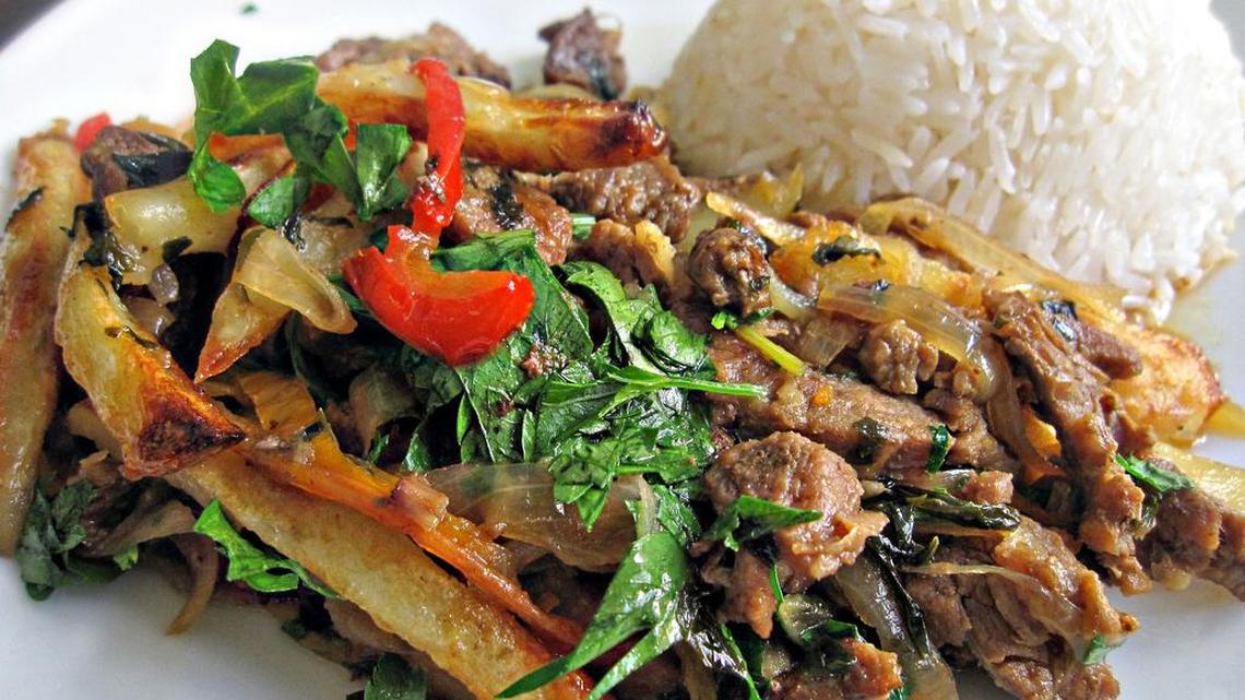 Dishes such as this lomo saltado are served at Lima Peruvian restaurant which opened this week at 3830 Rosewood Drive.