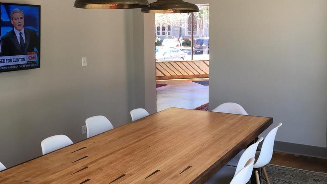 The Moore Company’s bowling alley table designed by Justin Drafts and made by carpenters Steve Voorhies and Scott Murrie.