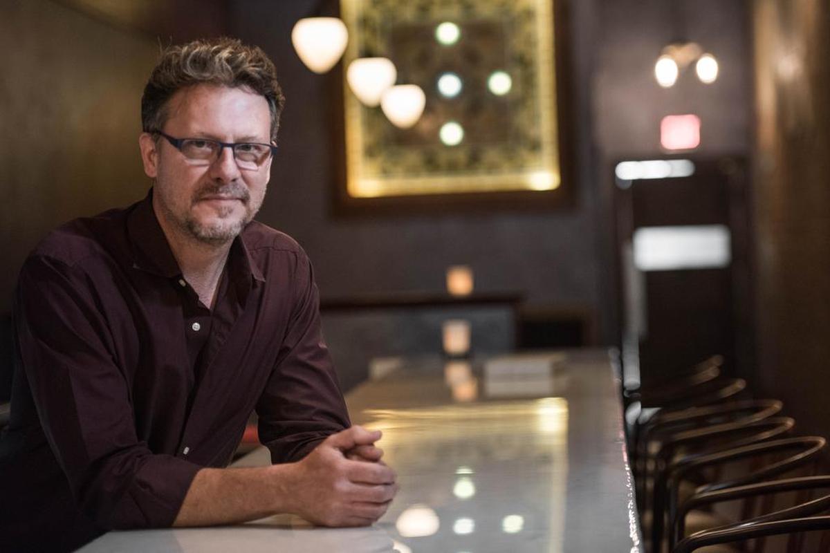 The wine parlor Lula Drake is now requiring proof of vaccination for people dining indoors as the coronavirus delta variant becomes more prevalent. Above, owner Tim Gardner at Lula Drake on Main Street in Columbia.
