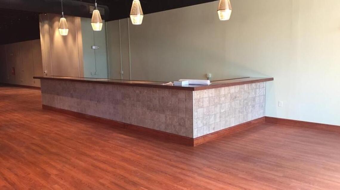 When will Main Street's boutique grocery store open?